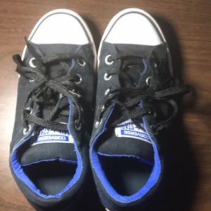 Black ,white, and blue converse
